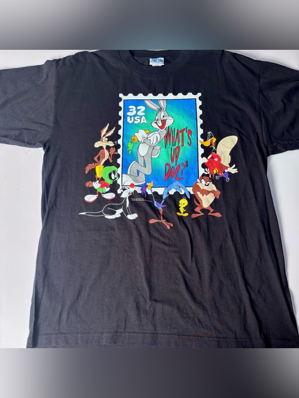 Vintage 1990s Looney Tunes "Stamp Collection" black t-shirt featuring Bugs Bunny